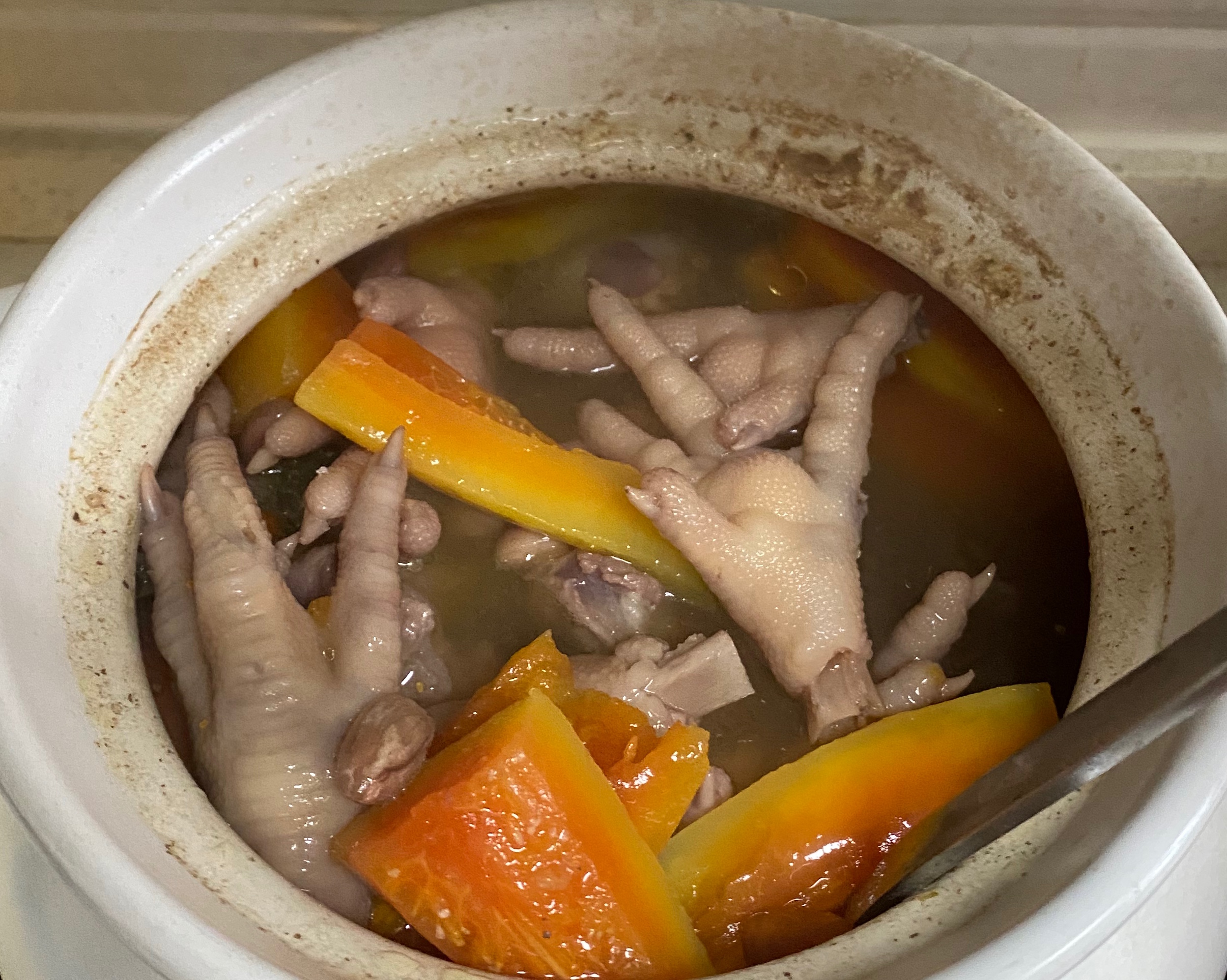 木瓜鸡脚花生眉豆汤的做法