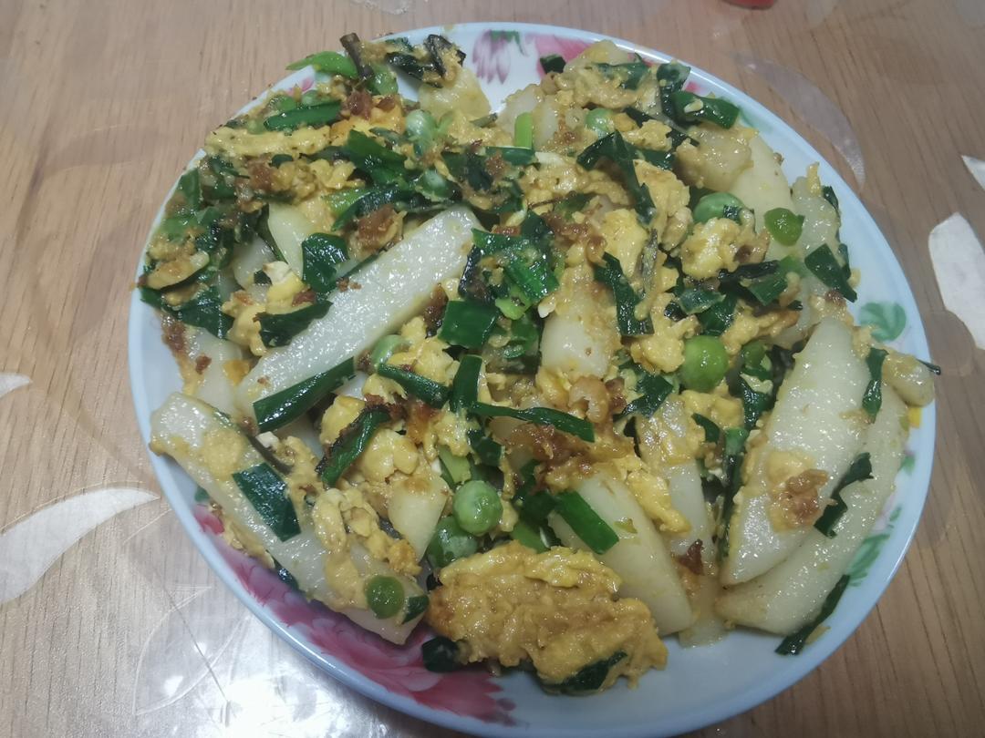 鸡蛋炒年糕                                    心里top1️⃣好吃的菜(简单快手)