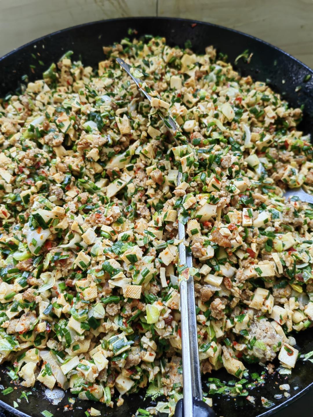 腊肉香葱豆腐干包子