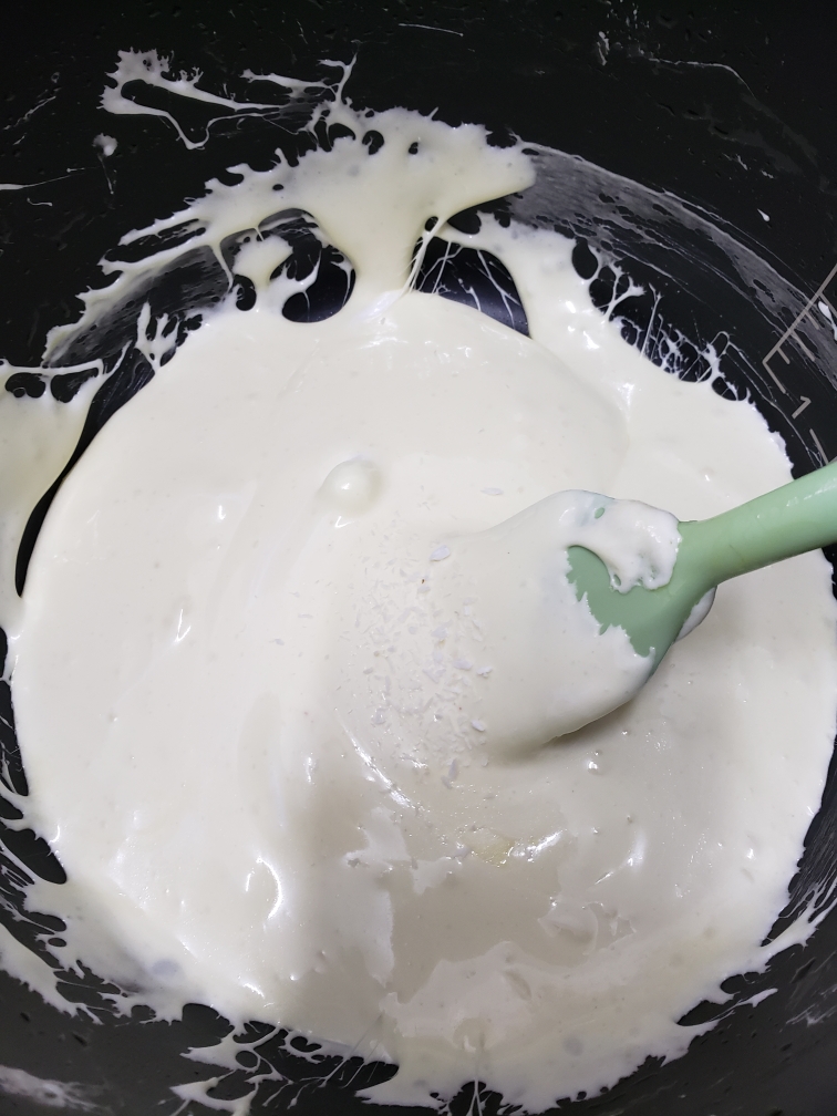 牛轧糖不要放奶粉，换一个口味，不太甜，更美味奥利奥椰丝牛轧糖【松下分体式饭煲】的做法 步骤5