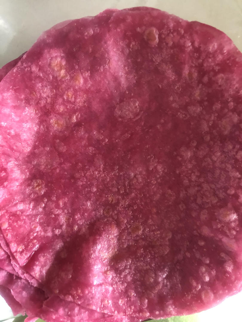 烙出来的薄饼筋道柔软薄如蝉翼