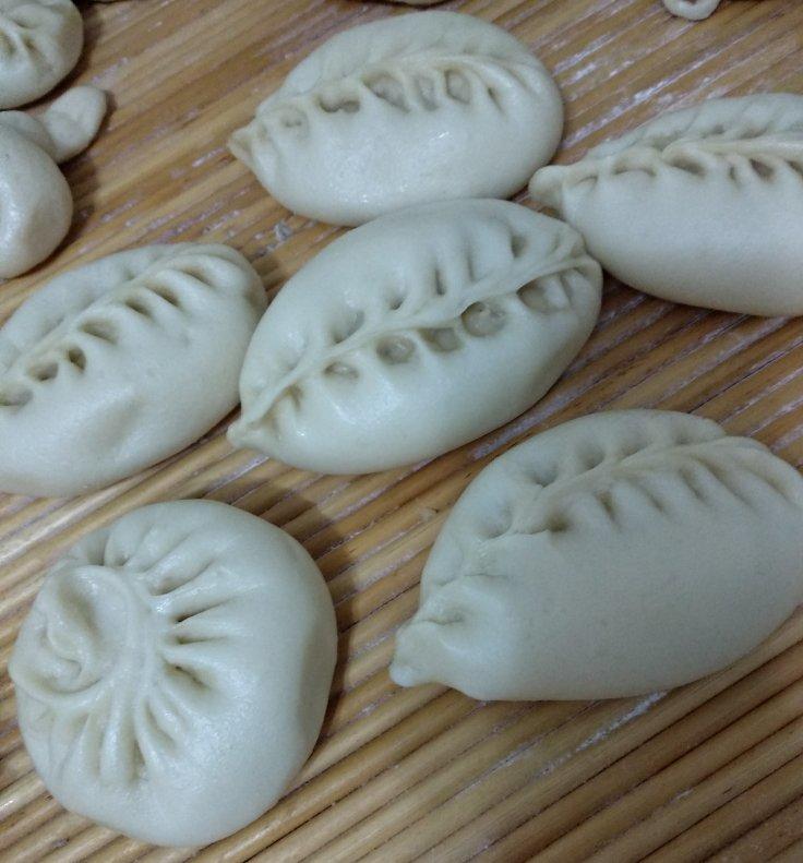 手机用户3037_ehu1做的弯柳叶包子包法