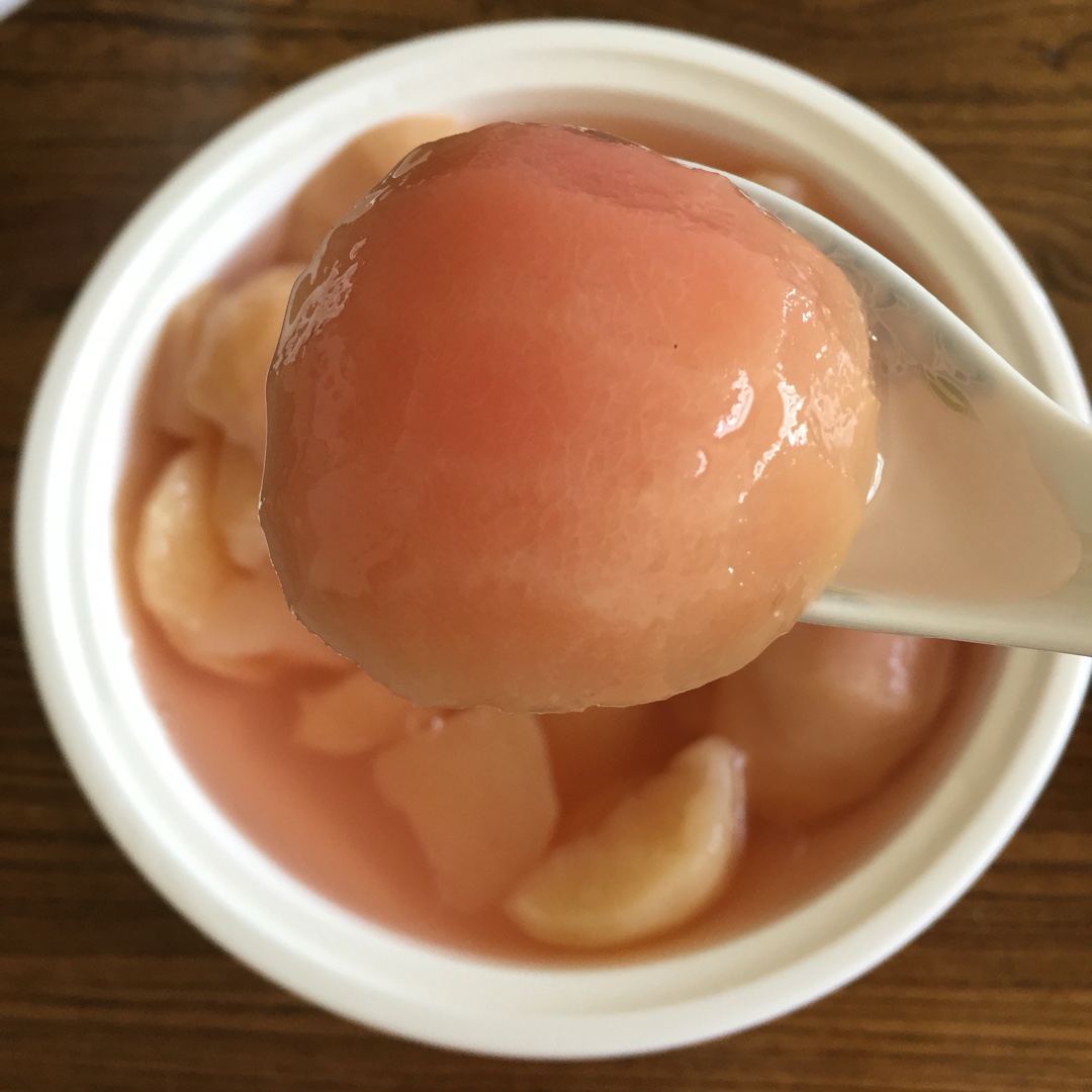 爱巧克李做的糖水桃罐头