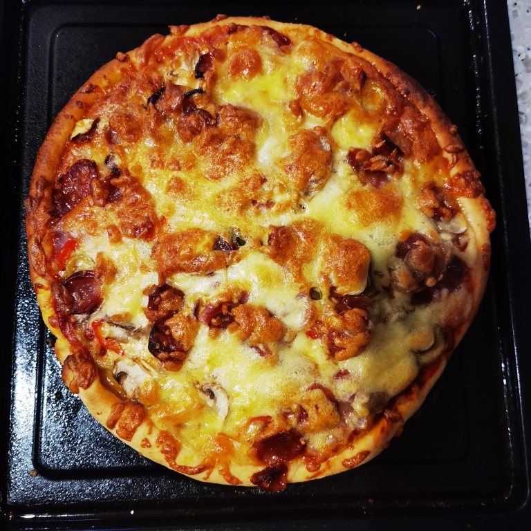 菜鸟的第一个手工披萨的做法