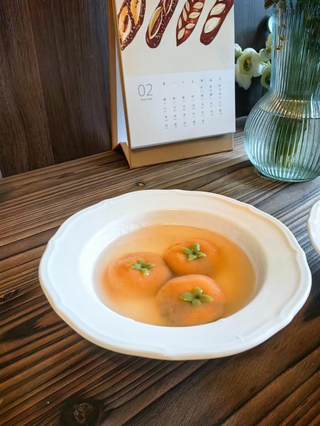 吃一口柿子汤圆，新的一年将有好事会发生哦！