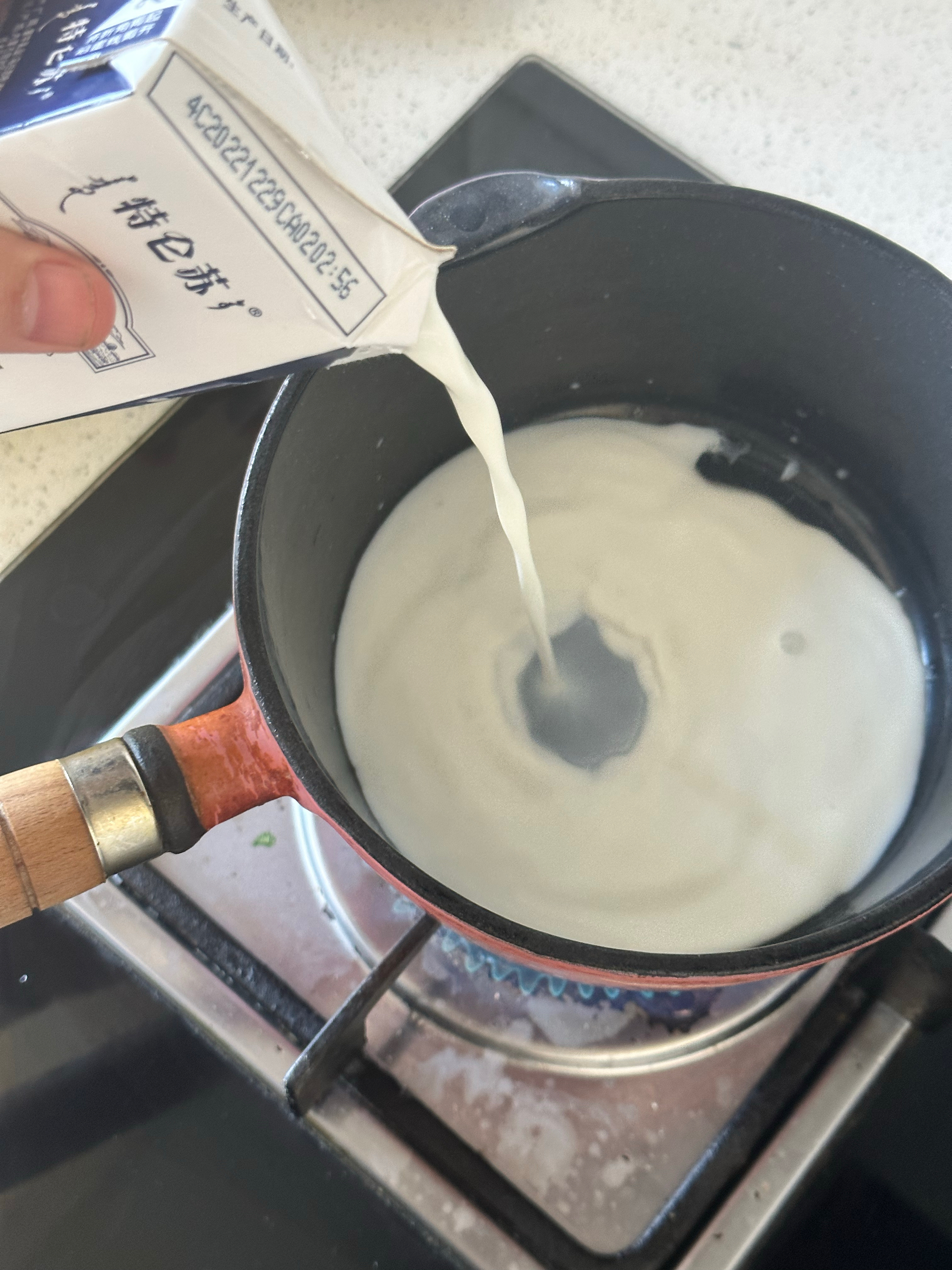 牛奶煮汤圆的做法 步骤2