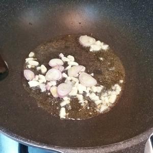 榄菜肉末炒豆粒的做法 步骤5