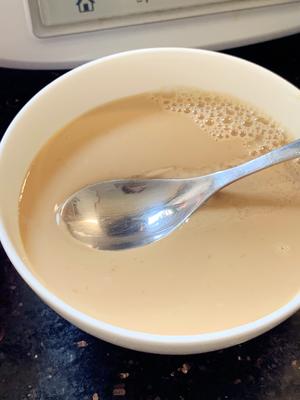 红糖姜汁撞奶的做法 步骤6