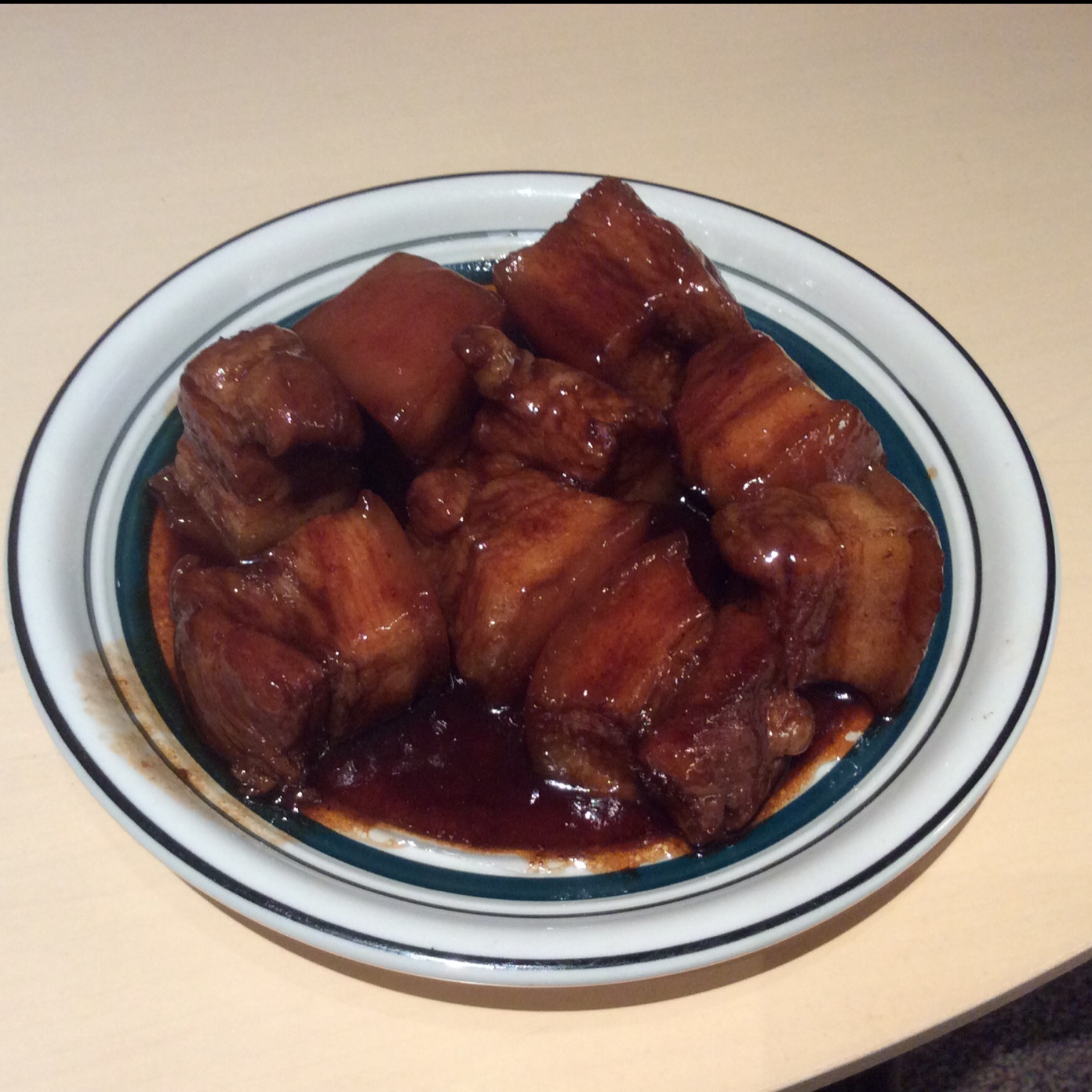 吃着碗里望着锅里的红烧肉