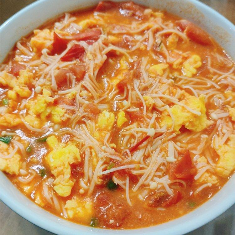 大鱼吃小鱼小鱼吃虾米做的金针菇番茄炒蛋