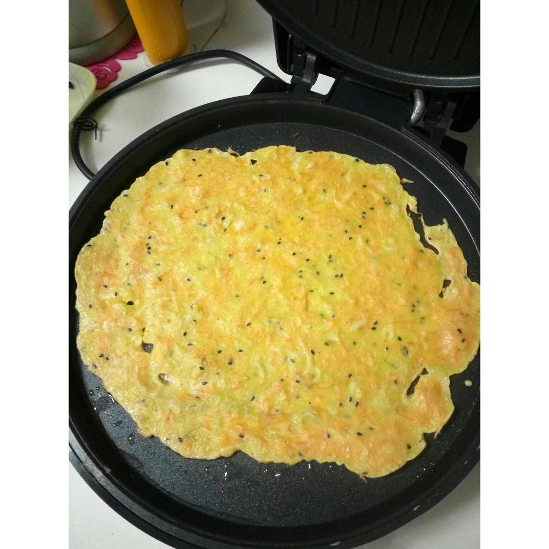 麦兜猪西西做的电饼铛胡萝卜丝葱花鸡蛋饼