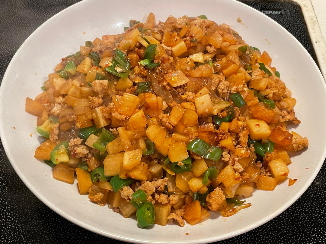 酸萝卜肉沫炒粉丝的做法