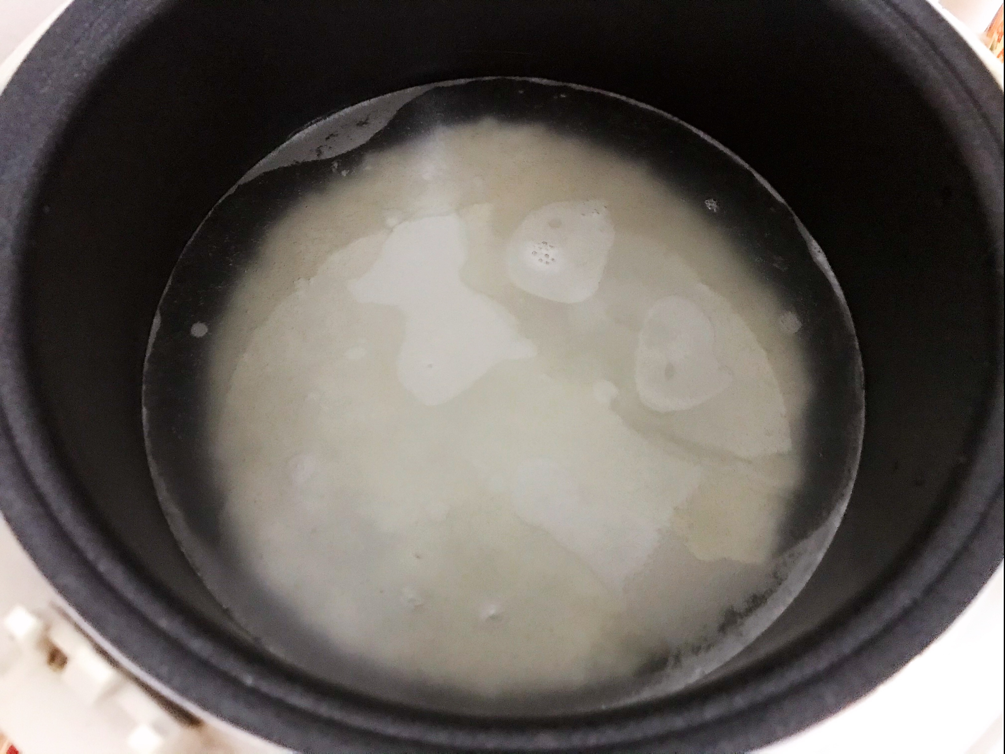懒人皮蛋香菇火腿粥的做法 步骤1