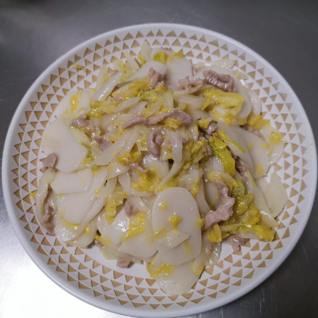 不挑锅、不焦不沾的黄芽菜肉丝炒年糕