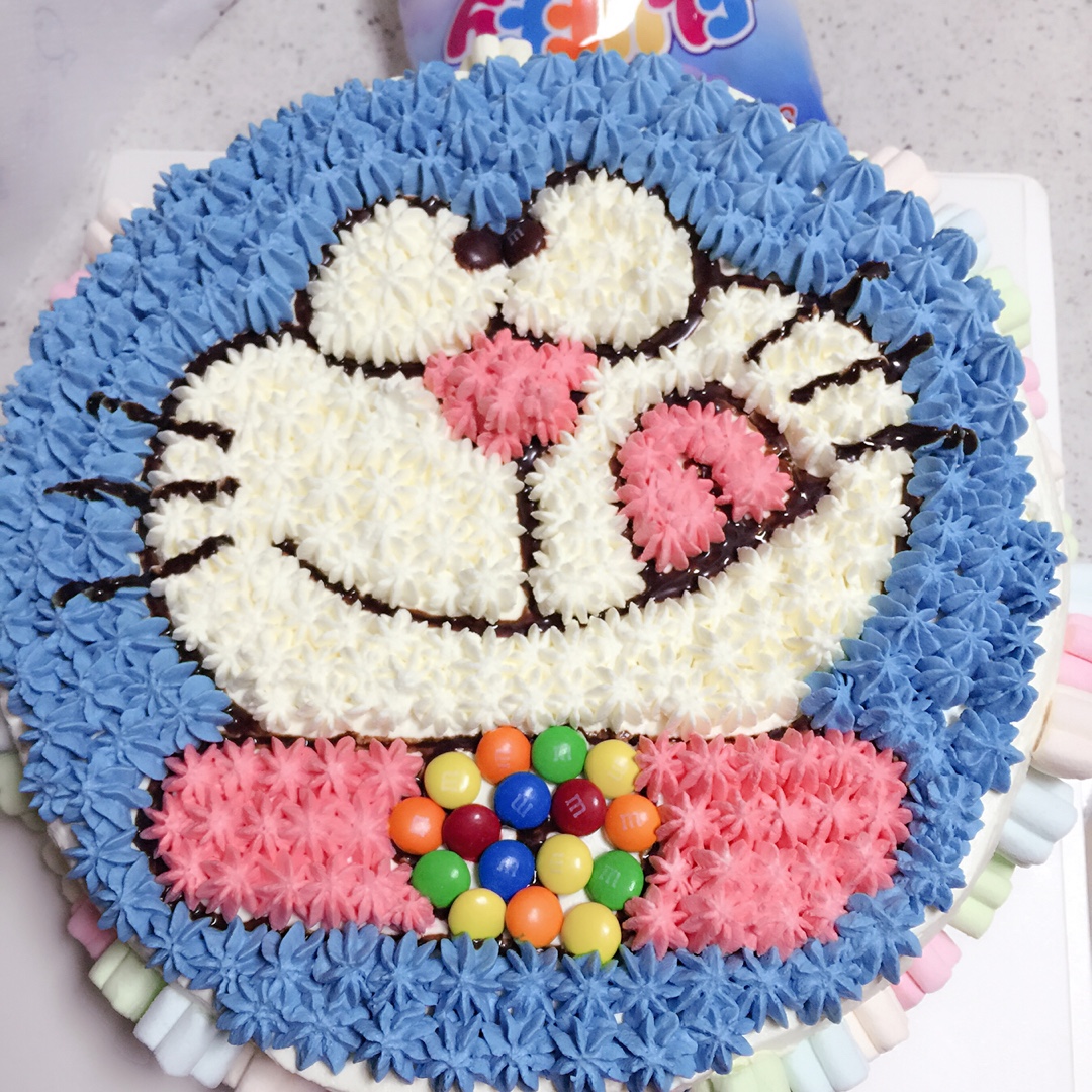 希依阿姐做的哆啦a梦蓝胖子卡通裱花蛋糕