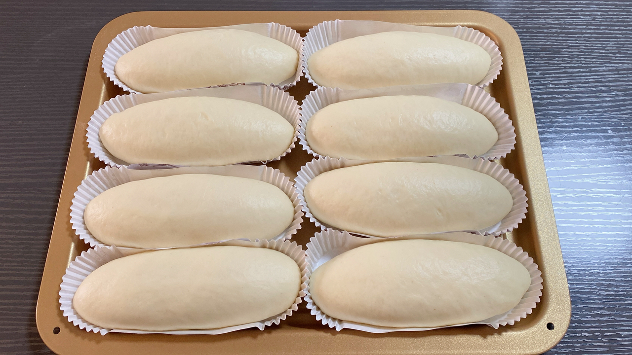 奶香椰蓉面包，出炉时满屋是奶香椰香的味道。的做法 步骤7