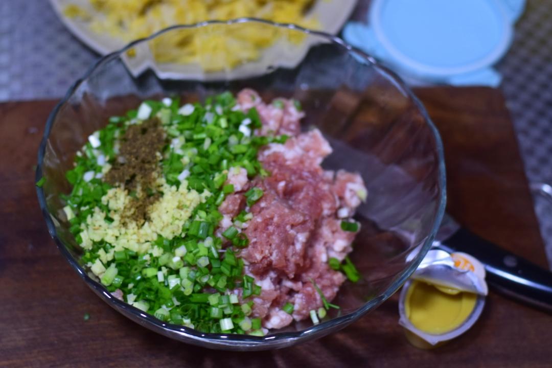 东北特色-鲜肉酸菜饺子的做法 步骤7