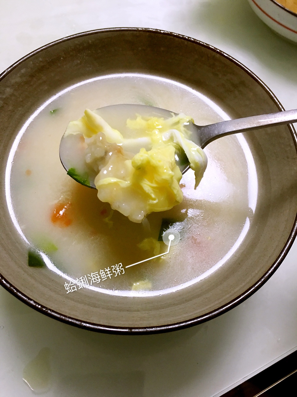 蛤蜊海鲜粥的做法