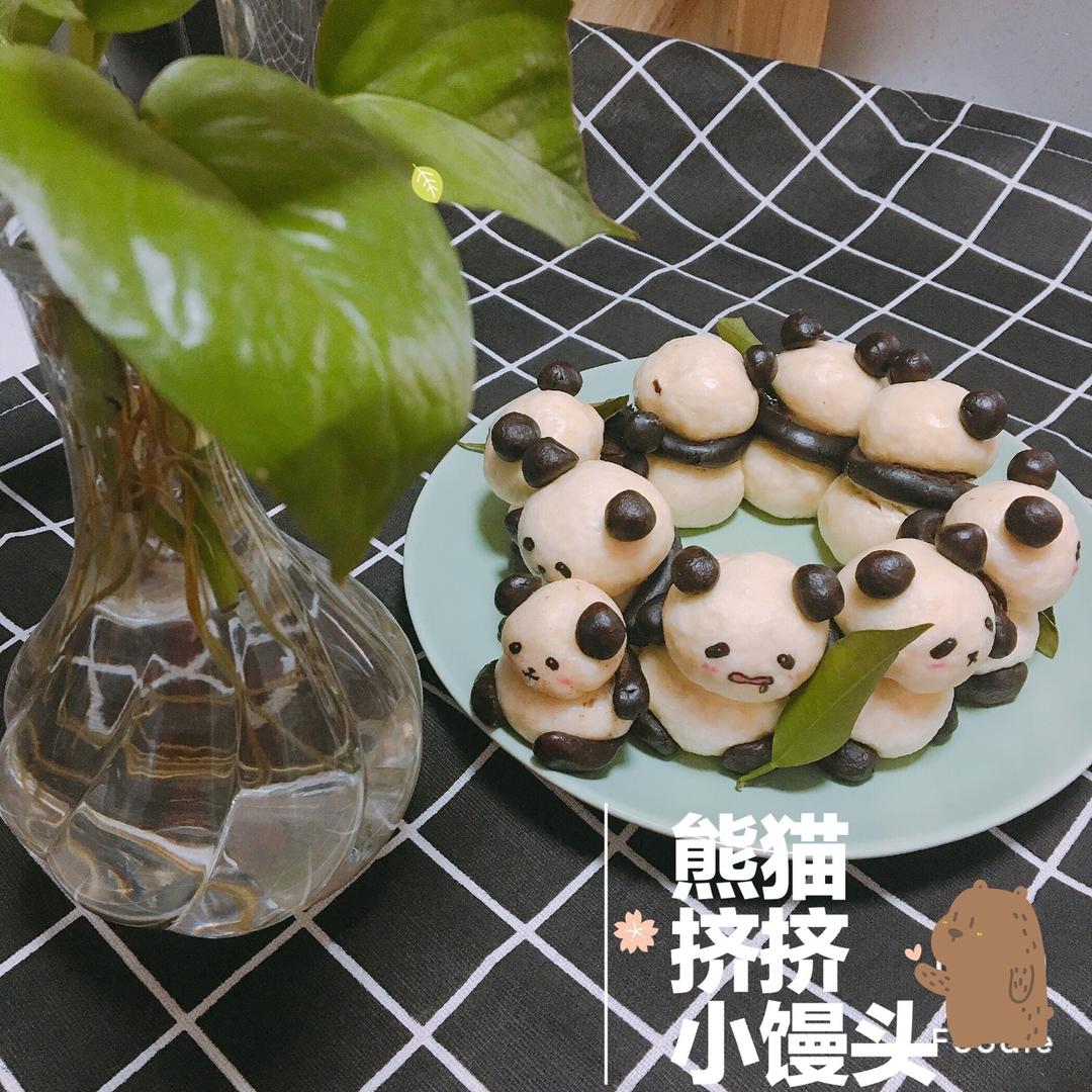 熊猫挤挤馒头