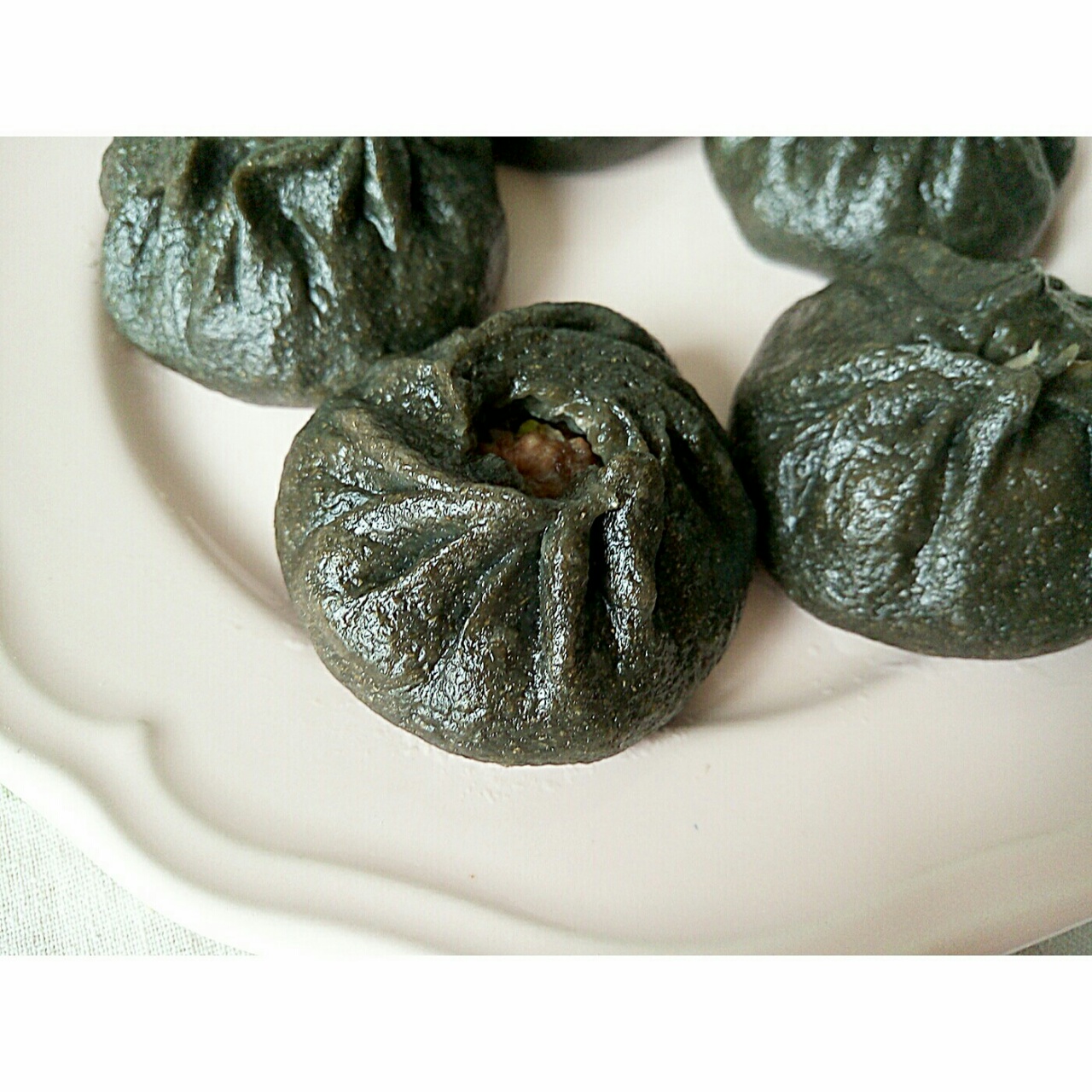 双椒干拌墨鱼饺