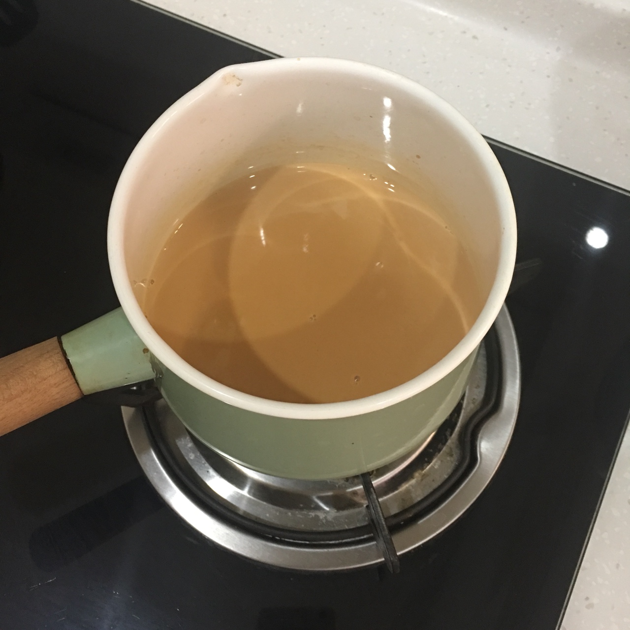 超快手锅煮奶茶的做法 步骤6
