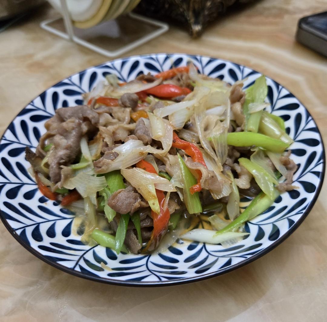炒了20多年的葱爆羊肉