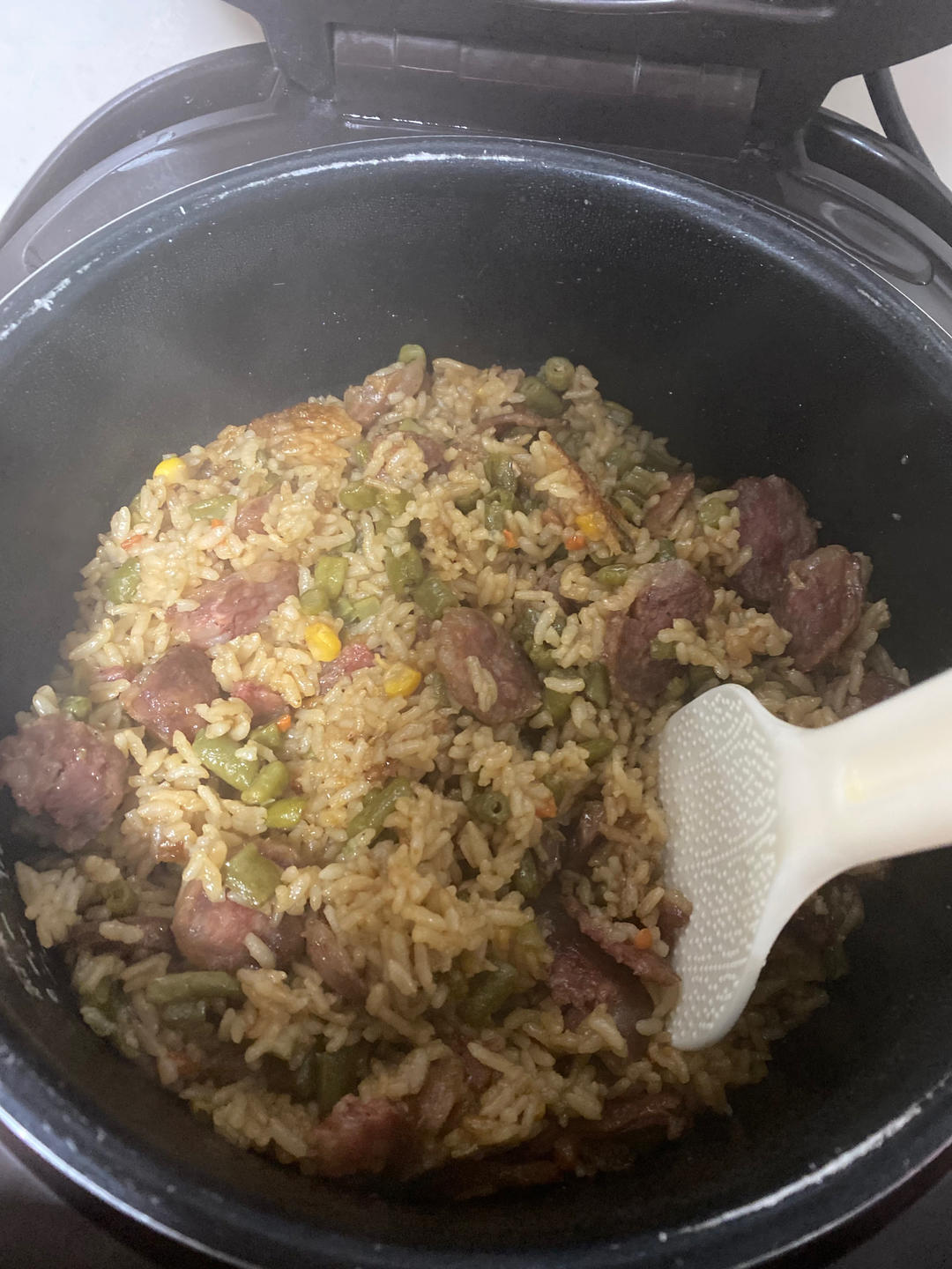 蒜香豆角腊肠焖饭