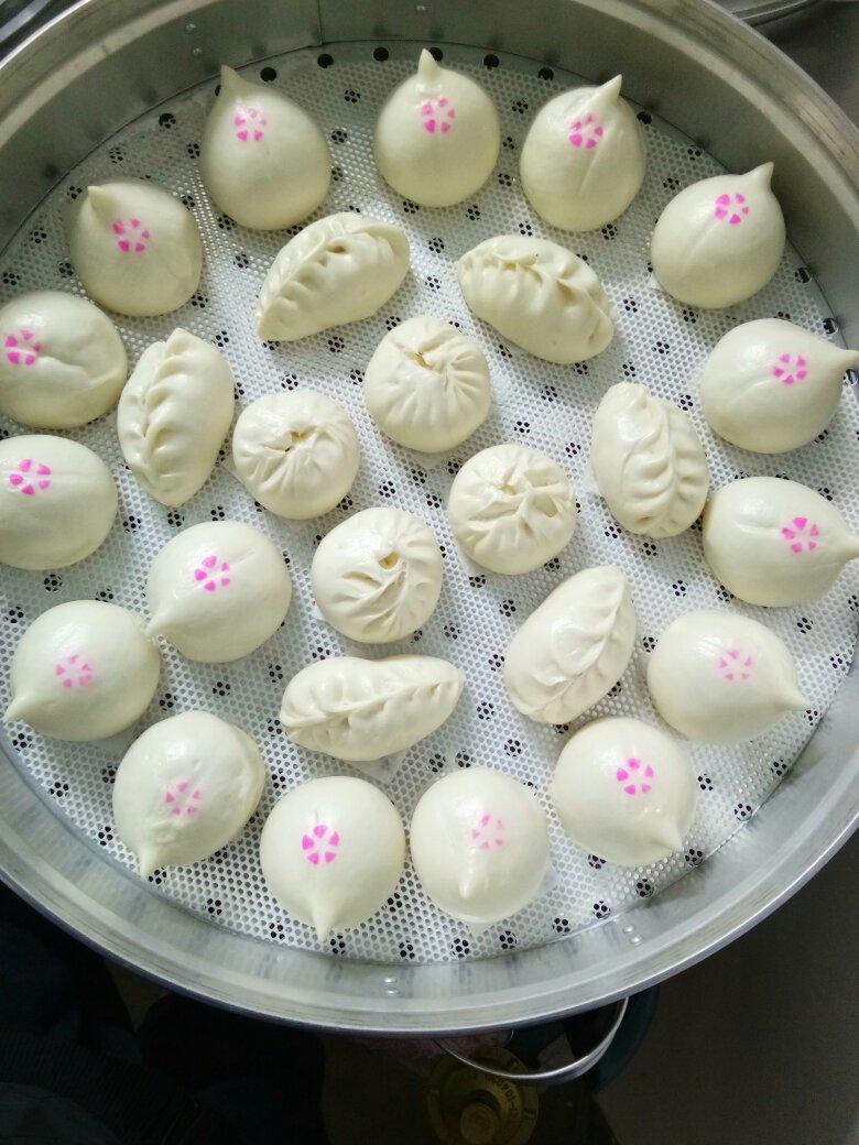 弯柳叶包子包法