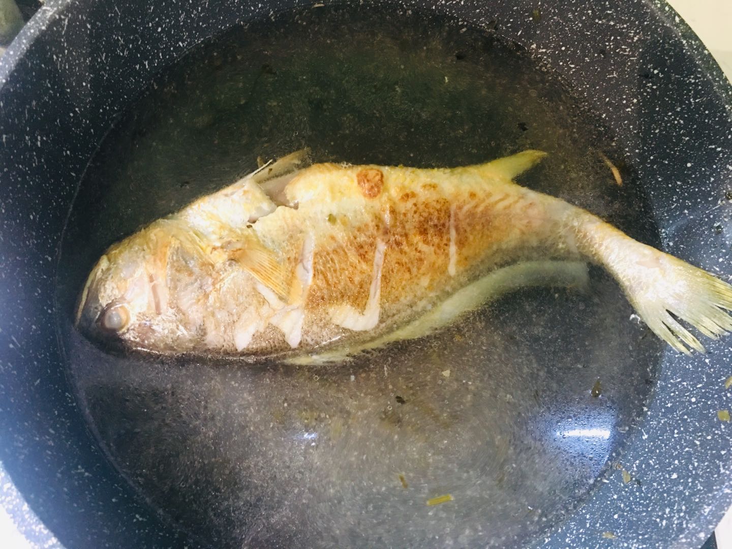 雪菜黄鱼汤的做法 步骤7