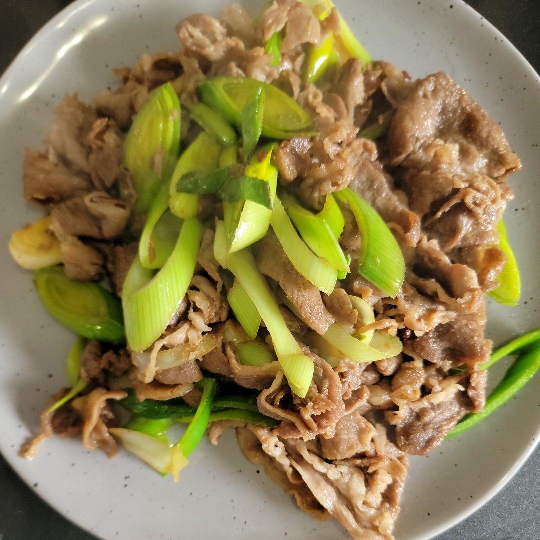 炒了20多年的葱爆羊肉