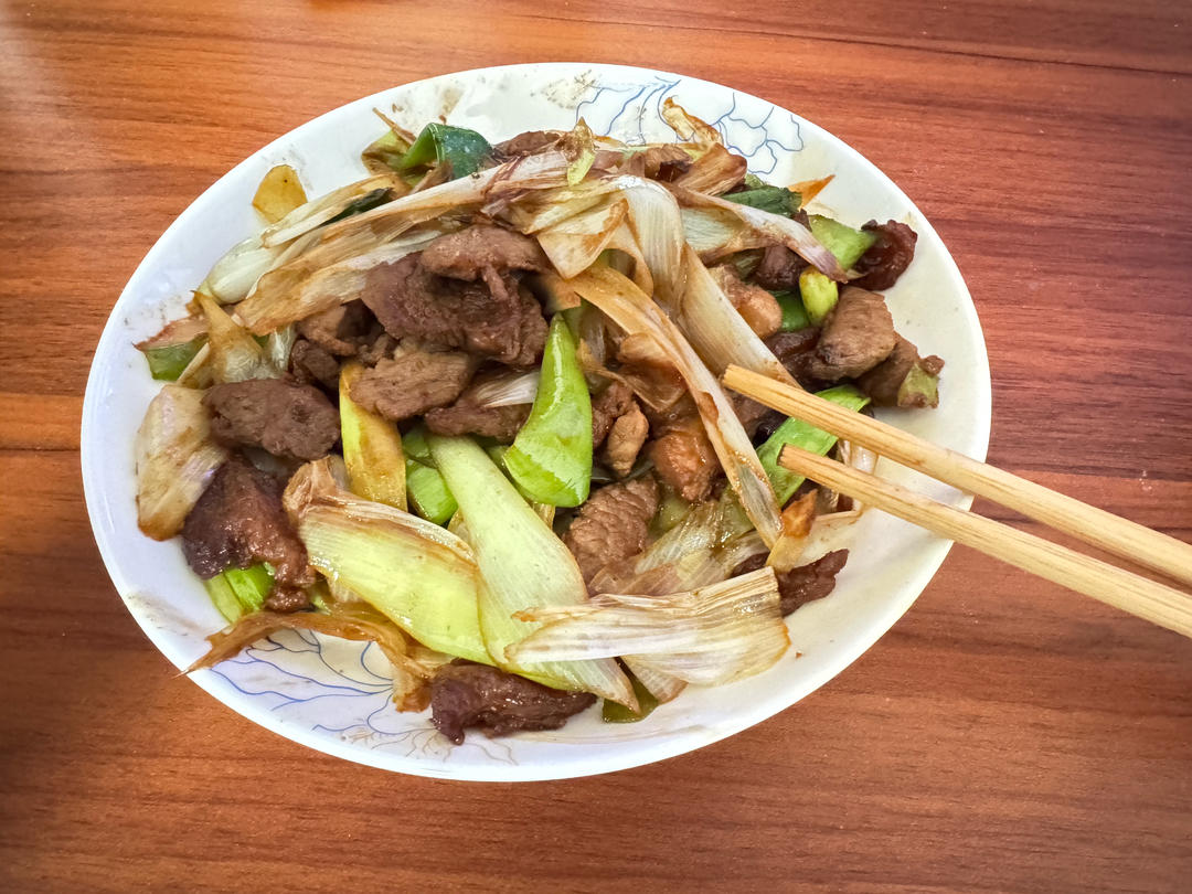 炒了20多年的葱爆羊肉