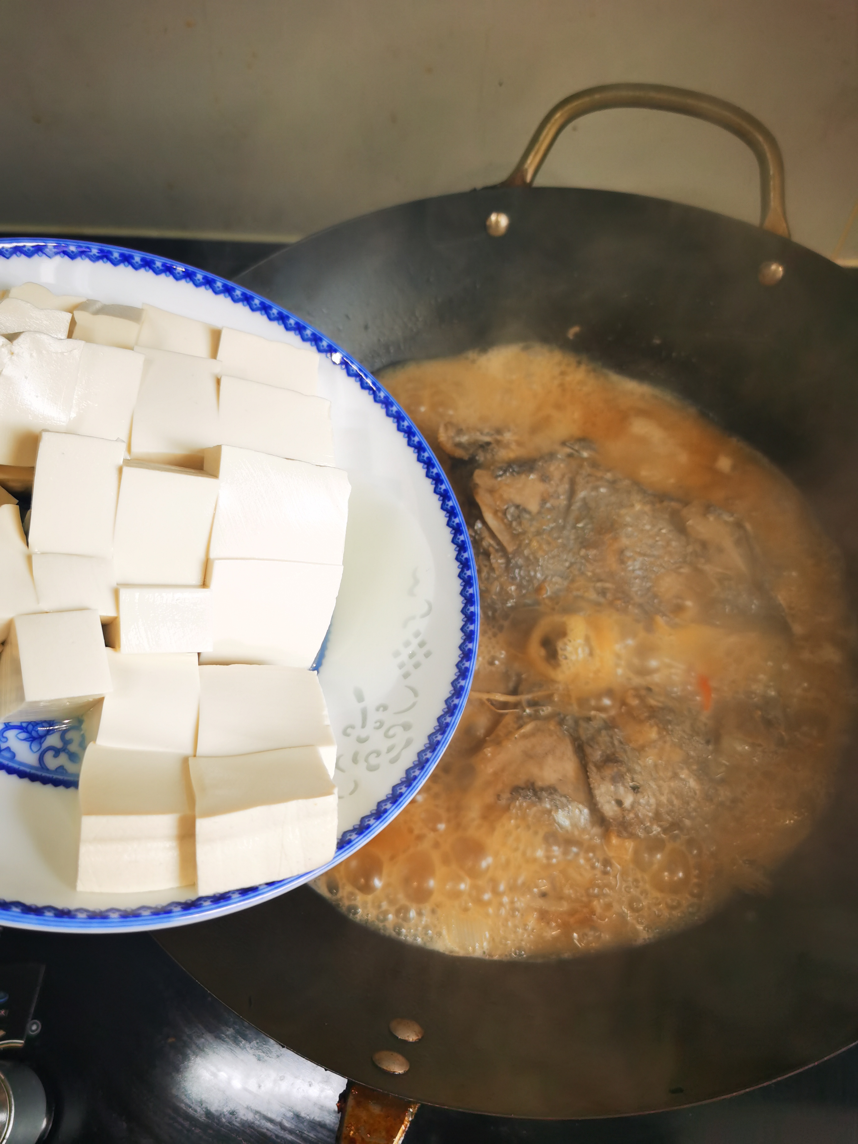 红烧鱼头豆腐汤的做法 步骤11