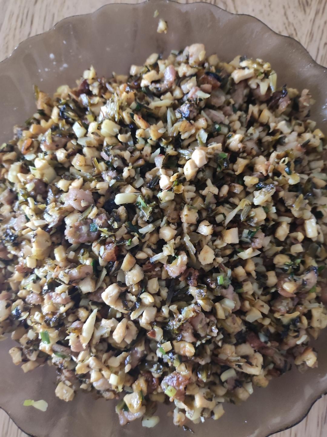 冬至习俗：冬笋雪菜肉豆腐馅与“团圆粿”