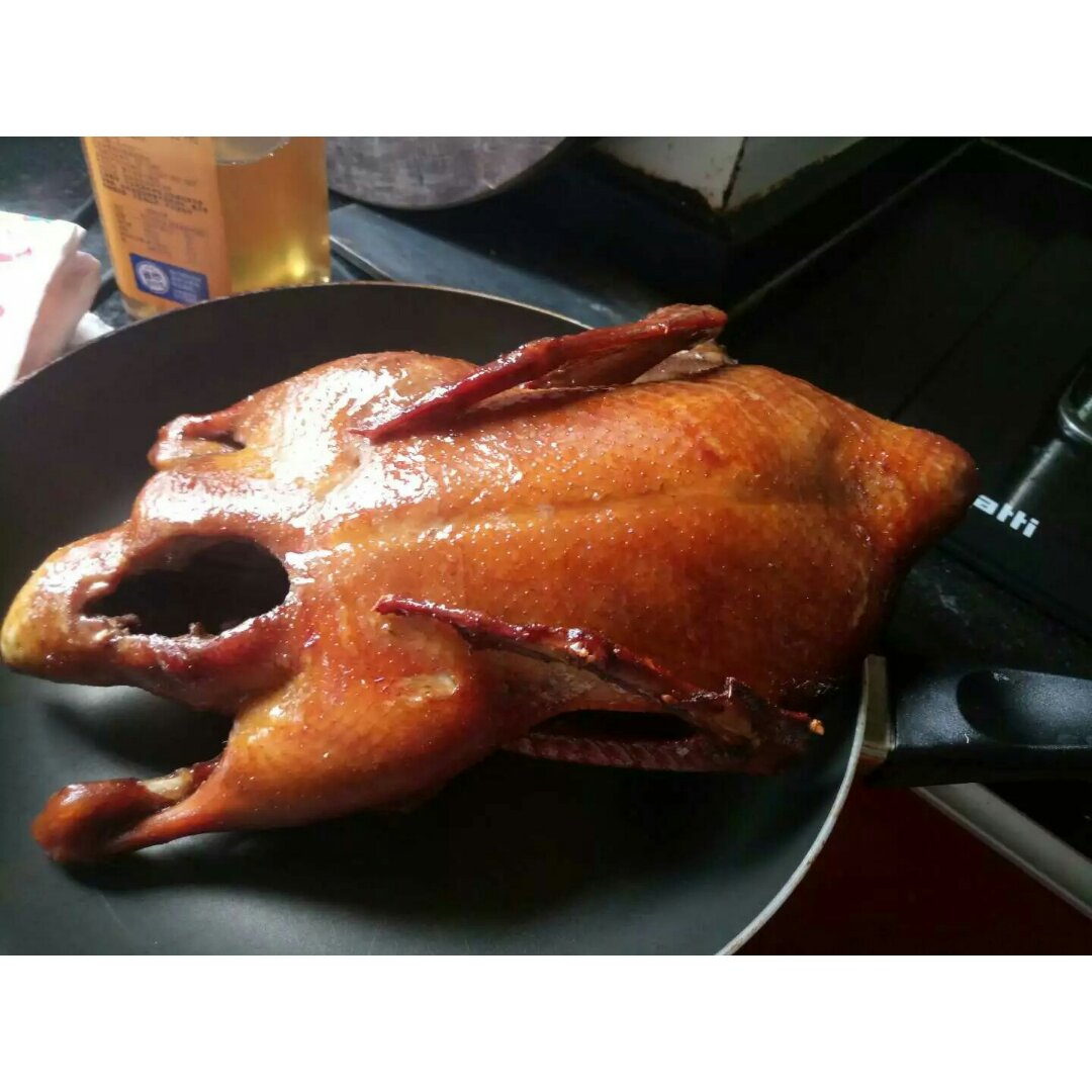 先蒸后烤鸭