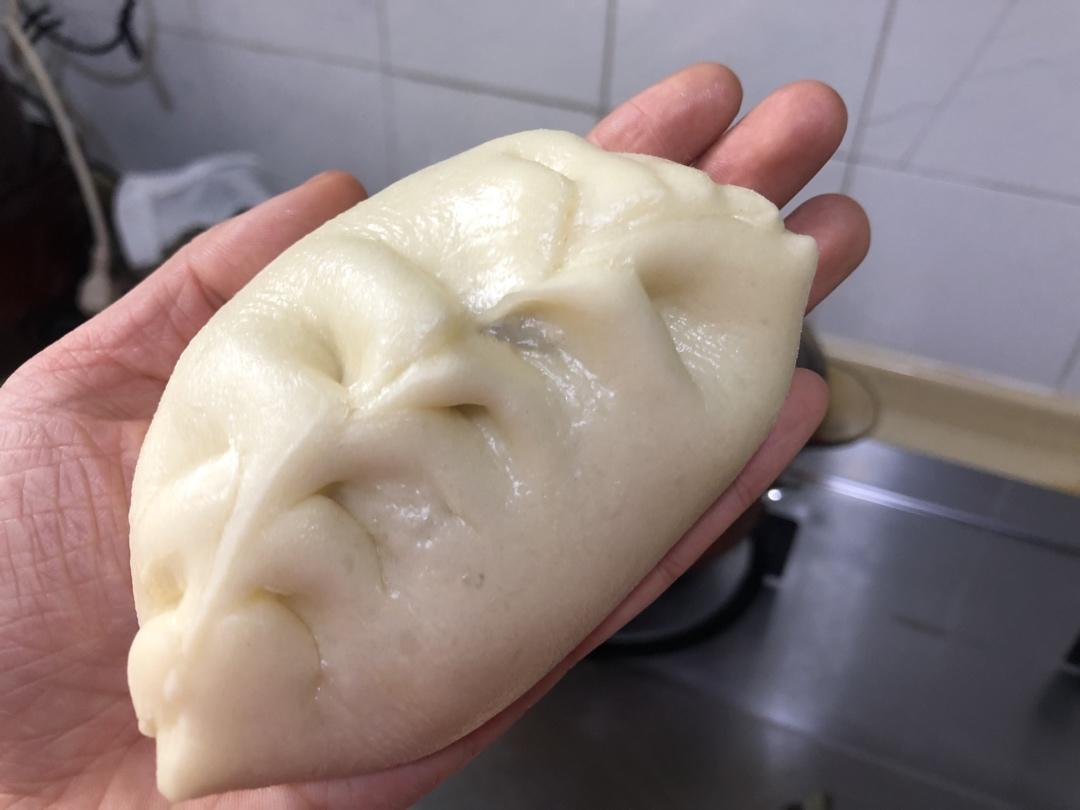 弯柳叶包子包法