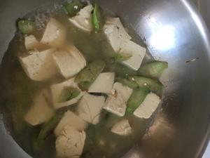丝瓜豆腐炖海蛎子的做法 步骤3