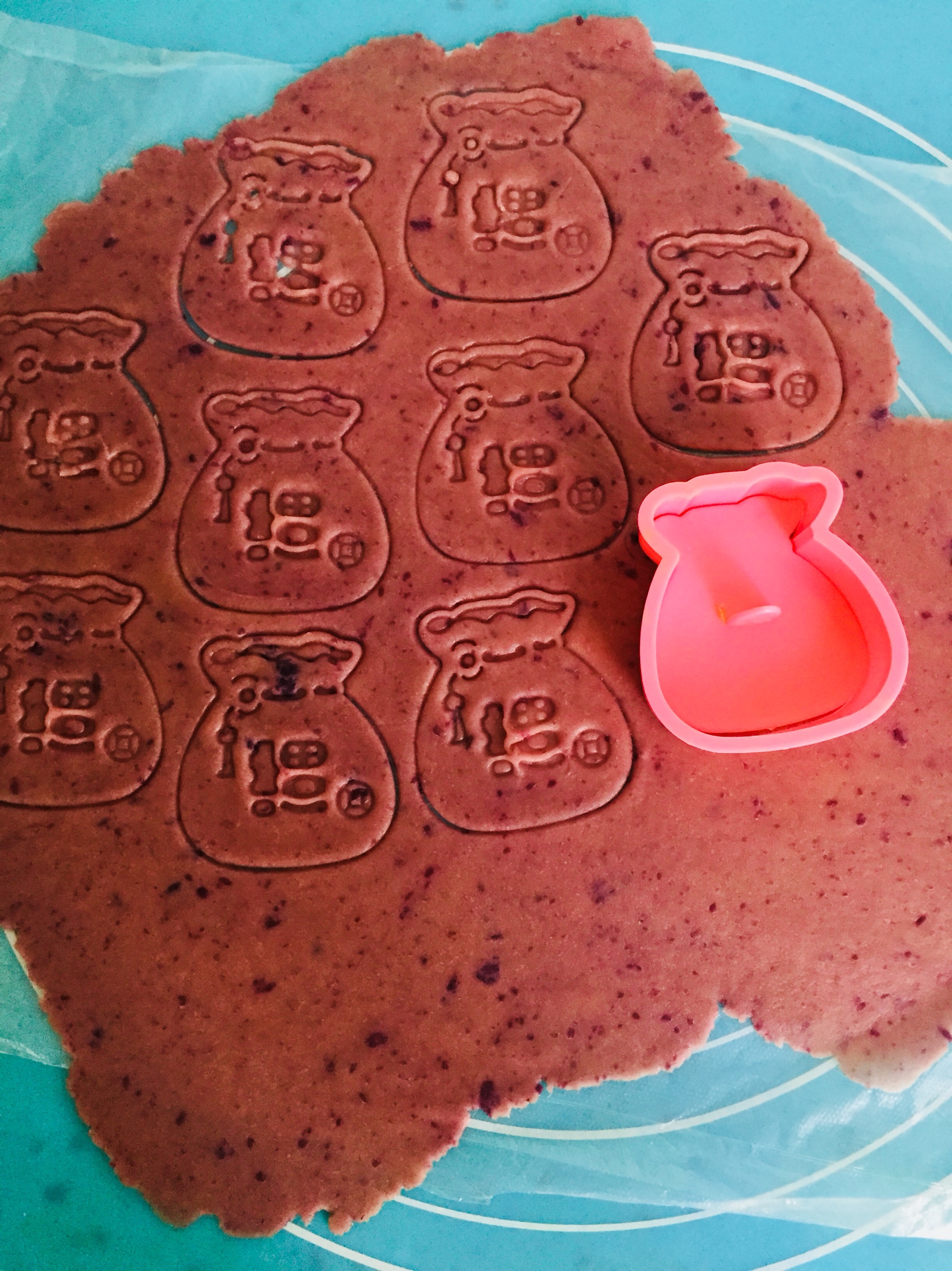 #麦子厨房#小红锅制作：宝宝零食～福袋紫薯小饼干的做法 步骤9