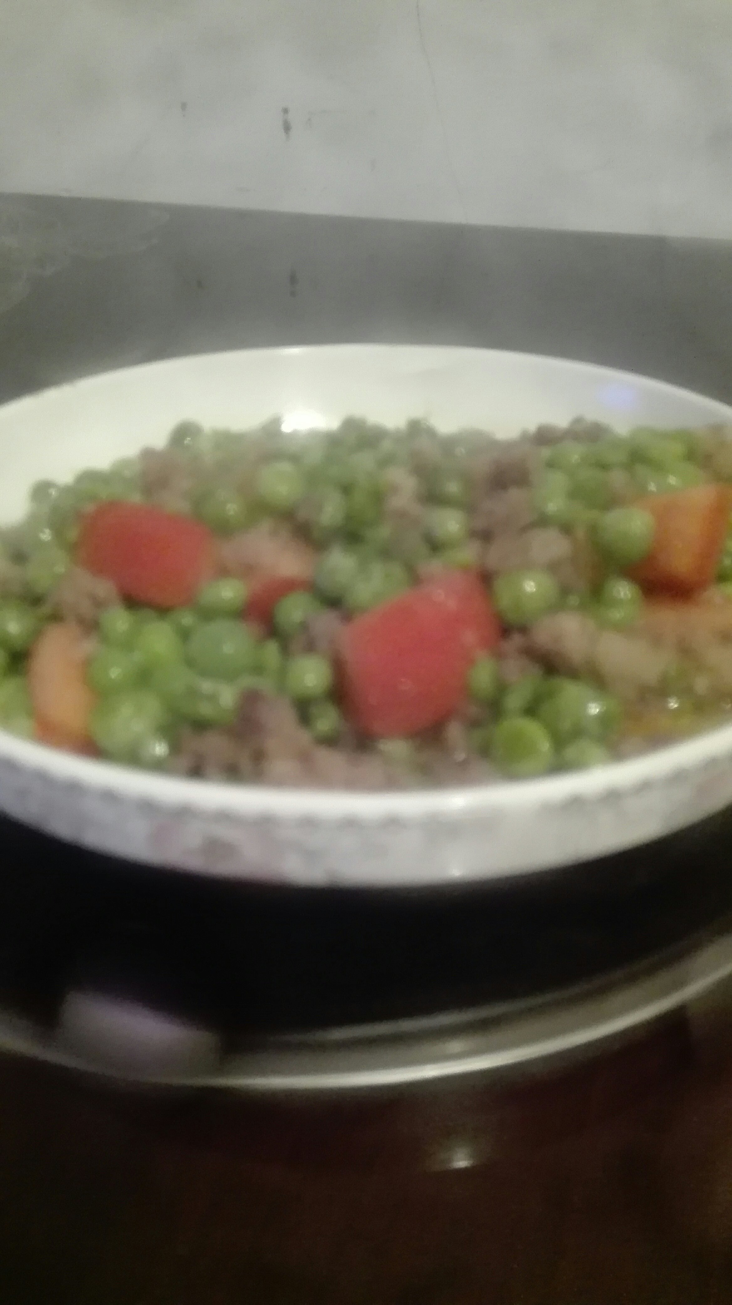 肉沫炒碗豆的做法
