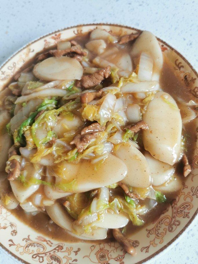不挑锅、不焦不沾的黄芽菜肉丝炒年糕
