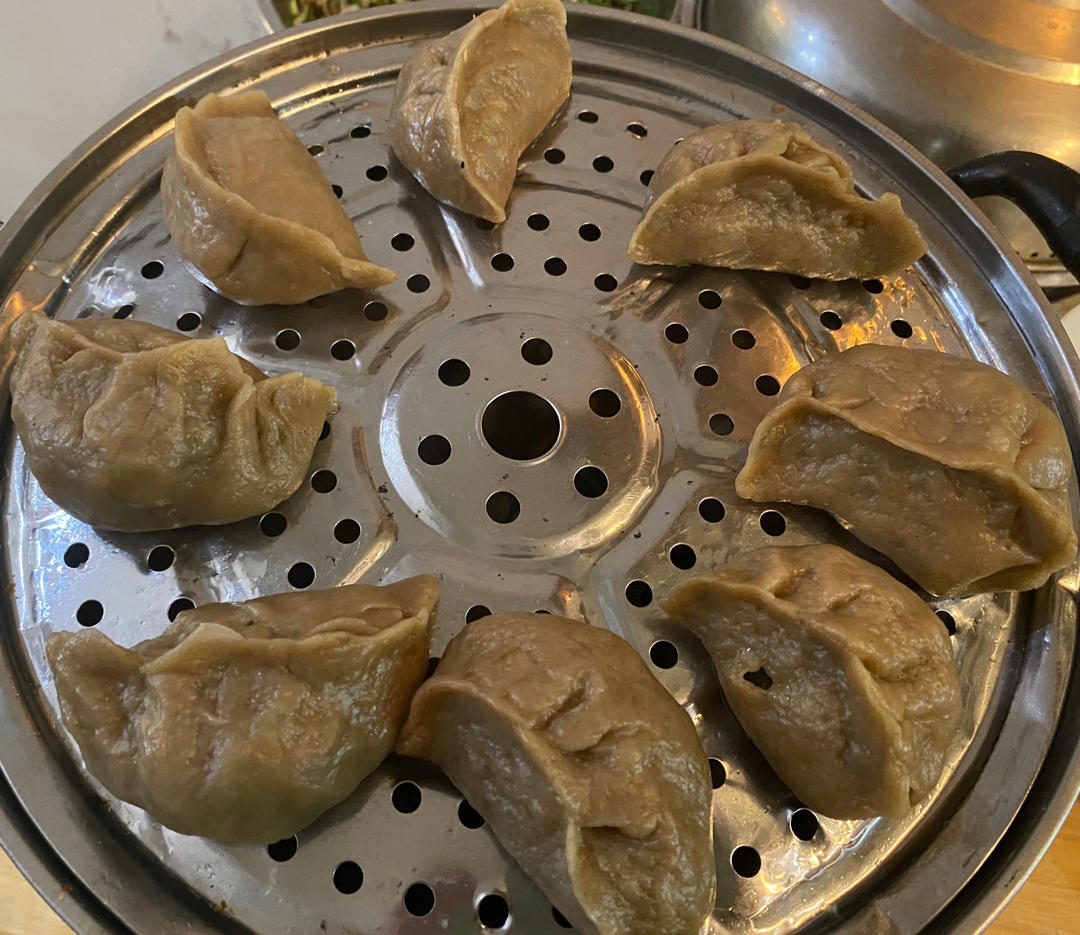 地瓜面槐花蛤蜊肉包子