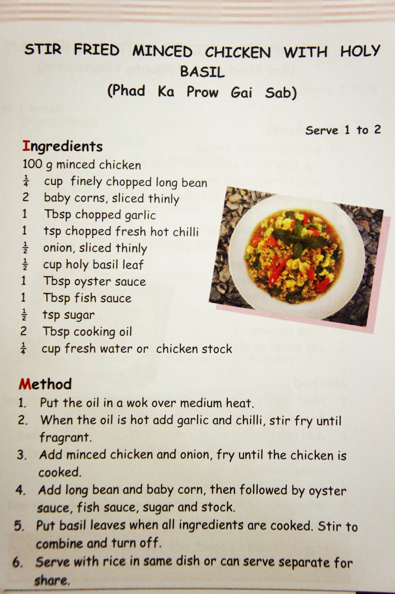 Stir fried minced chicken with holy basil