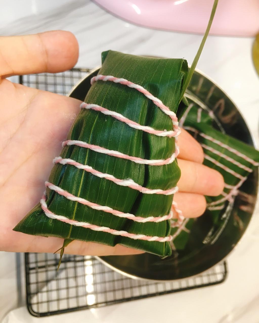 www雯儿做的四角长粽子的包法(有视频)