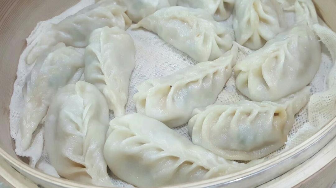 弯柳叶包子包法