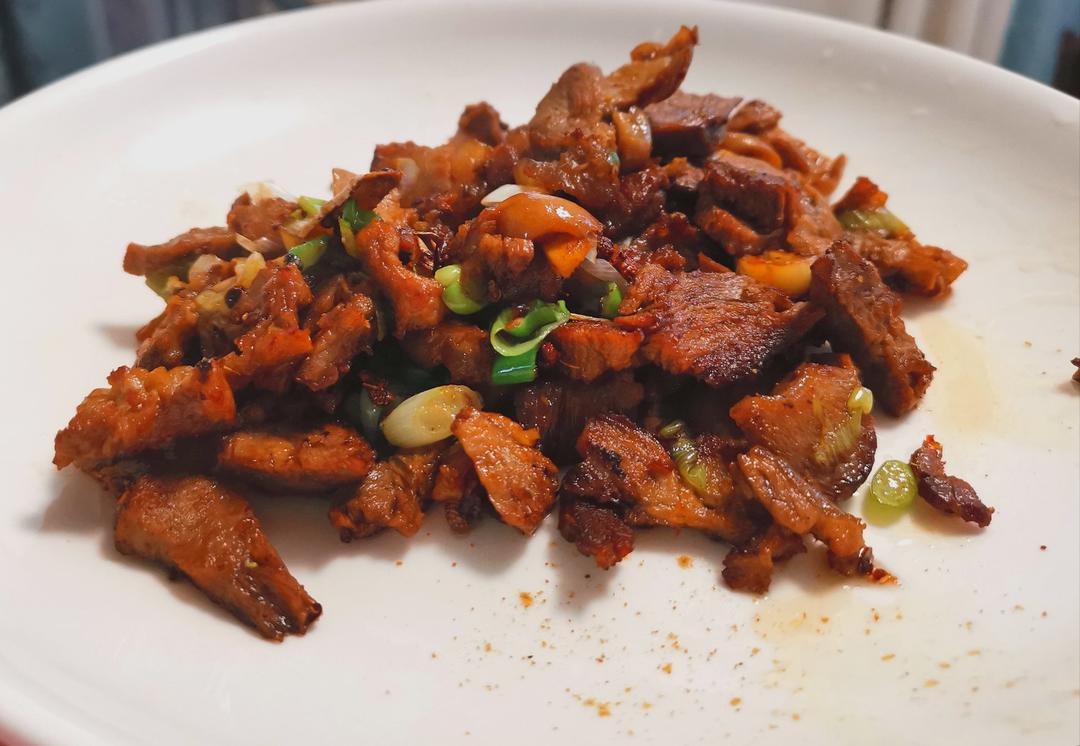 炒了20多年的葱爆羊肉
