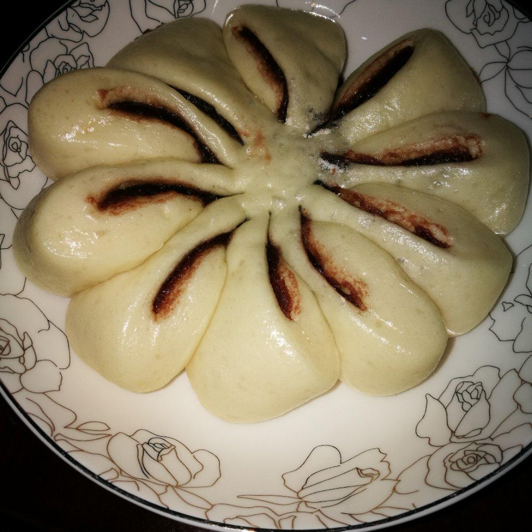 手机用户1765_8qnx做的豆沙花朵包