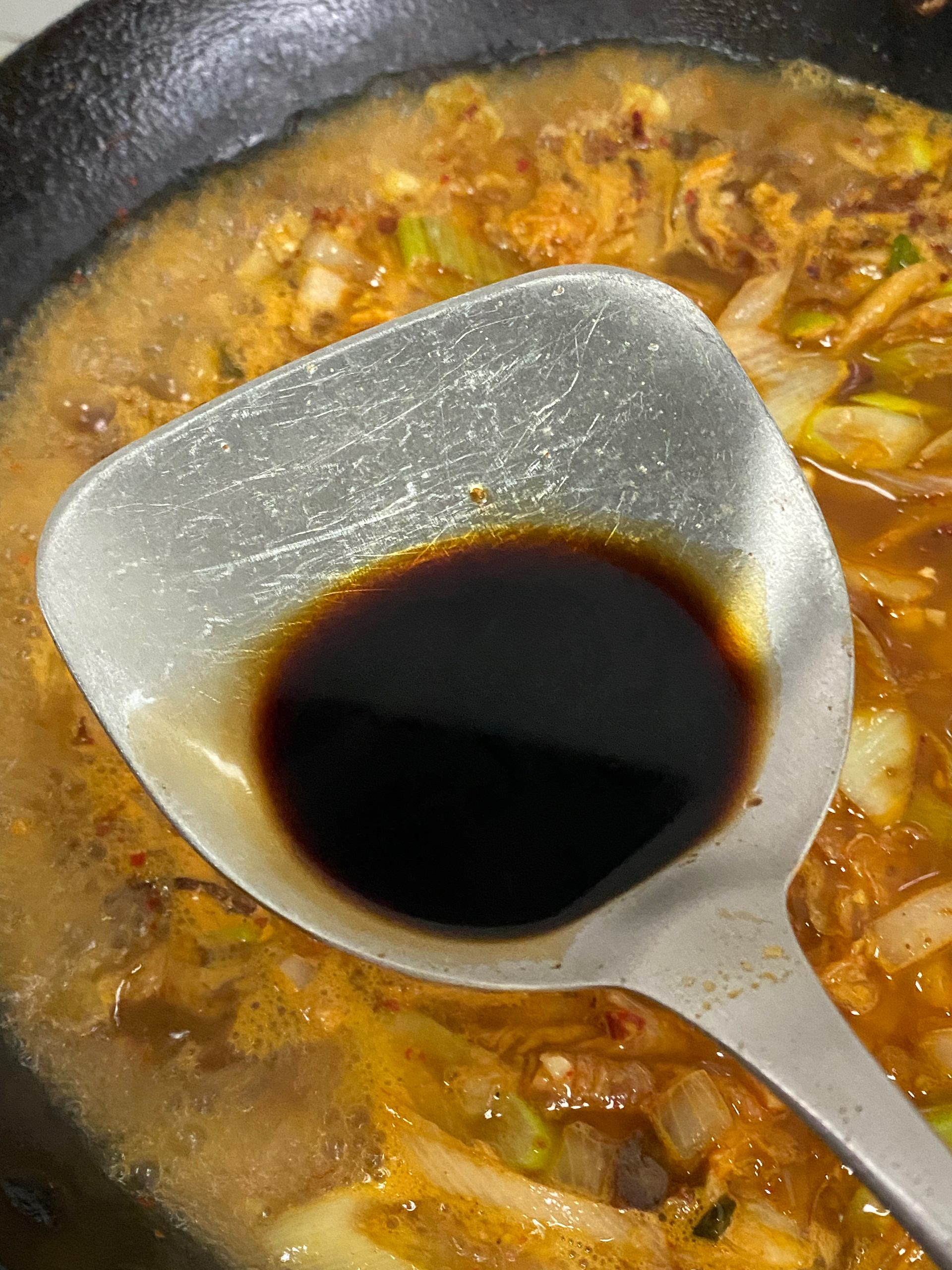 热辣鲜香的五花肉泡菜豆腐汤-能下两碗饭的做法 步骤10