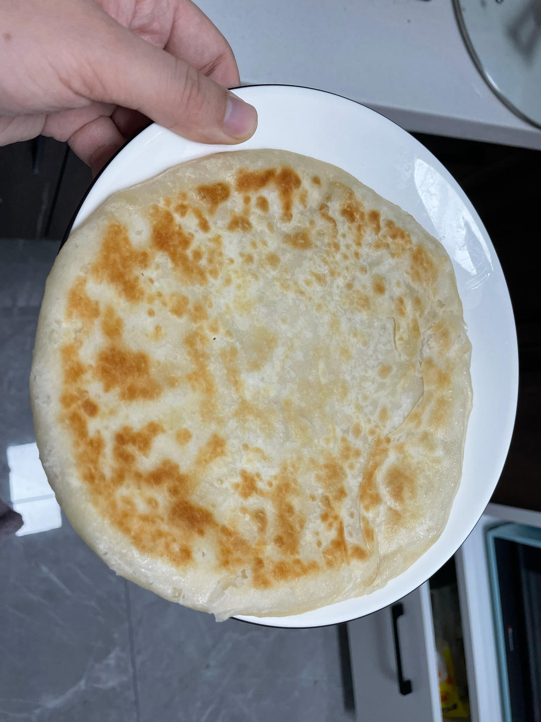 烙饼不硬的小窍门 掌握了你也能看出柔软多层凉了不硬的小油饼