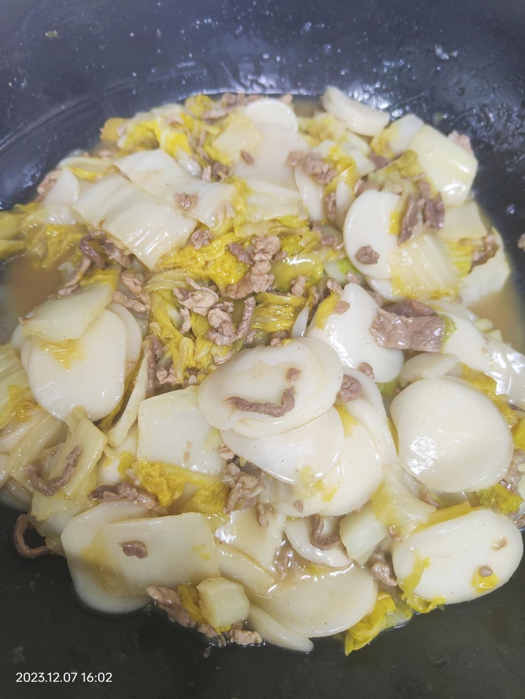 不挑锅、不焦不沾的黄芽菜肉丝炒年糕