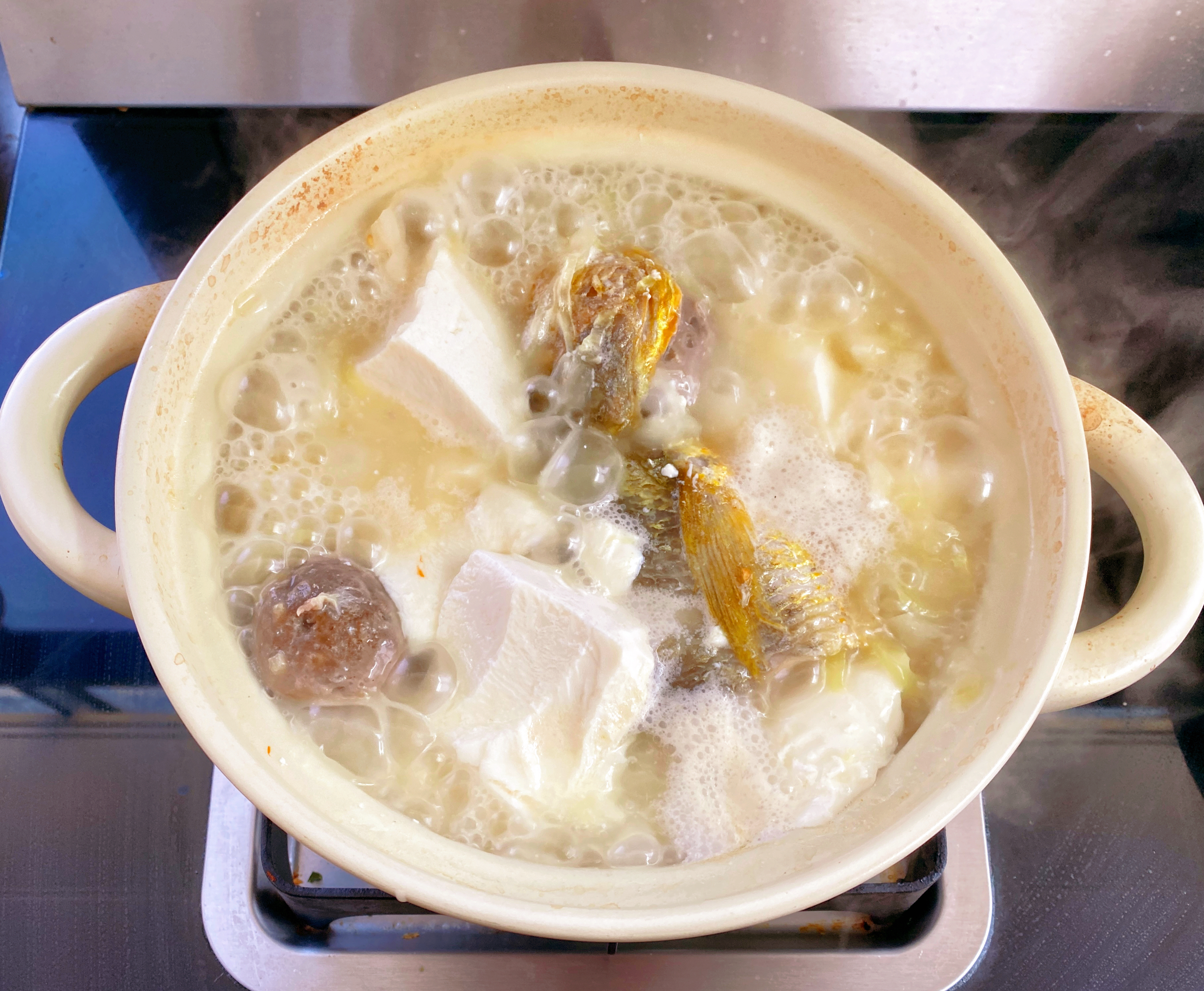 黄鱼酸菜豆腐汤的做法 步骤7