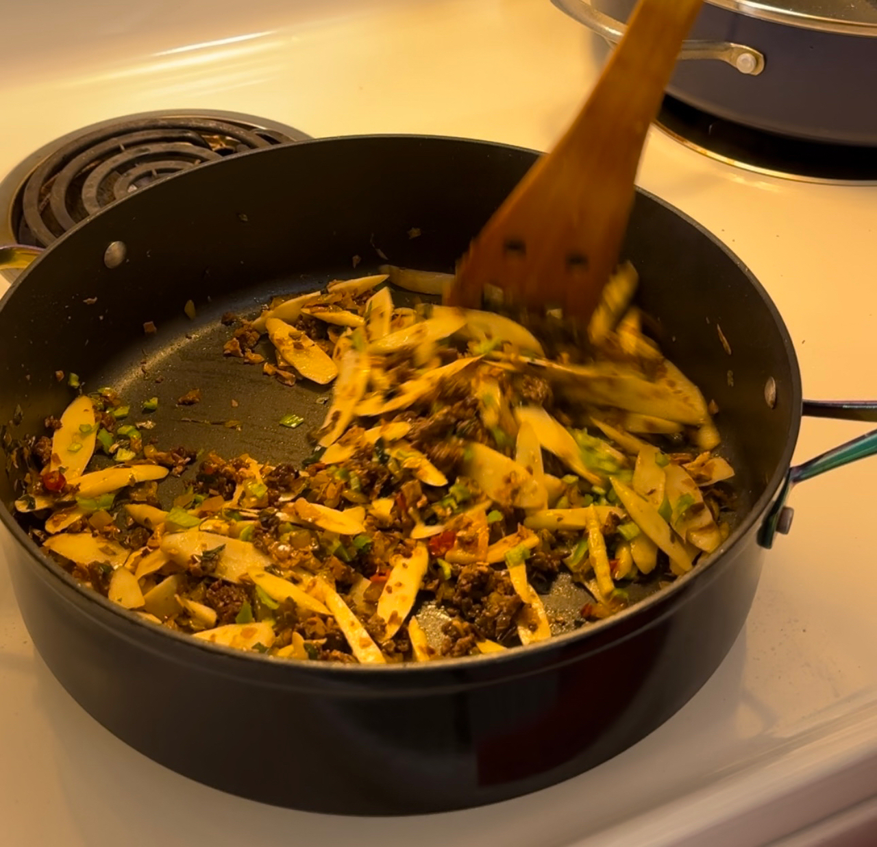 梅干菜酸菜肉末笋片的做法 步骤12